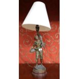 A 20th century spelter figural table lamp "Retour De Peche" signed Rousseau Condition Report: