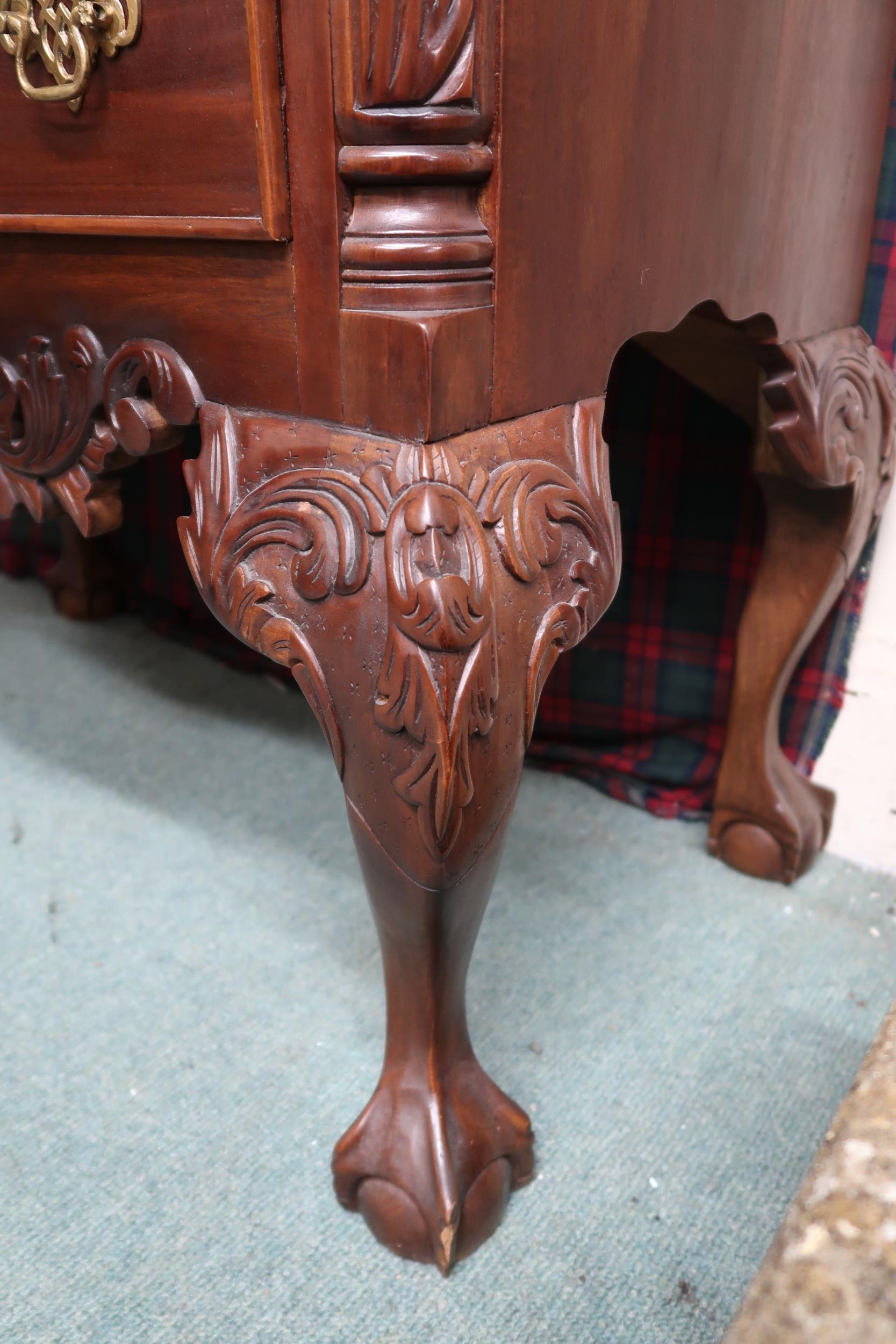 A 20th century mahogany lowboy style chest of drawers with one long over three short drawers on ball - Image 3 of 3