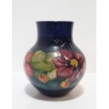 A Moorcroft Clematis pattern vase Condition Report:Available upon request