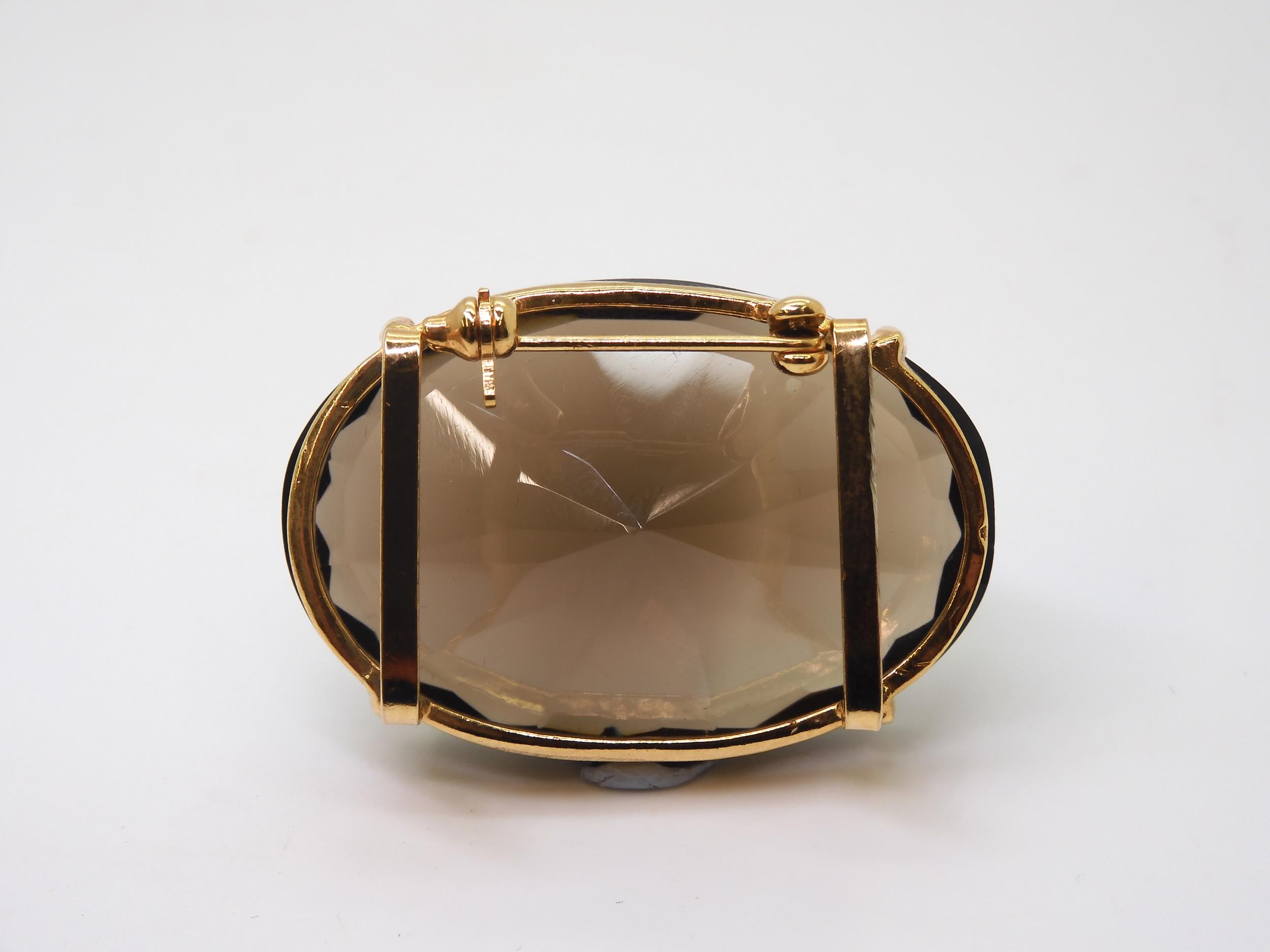 A 14k gold smoky quartz ring, with similar gold plated brooch and pendant, the pendant with a 14k - Image 3 of 5