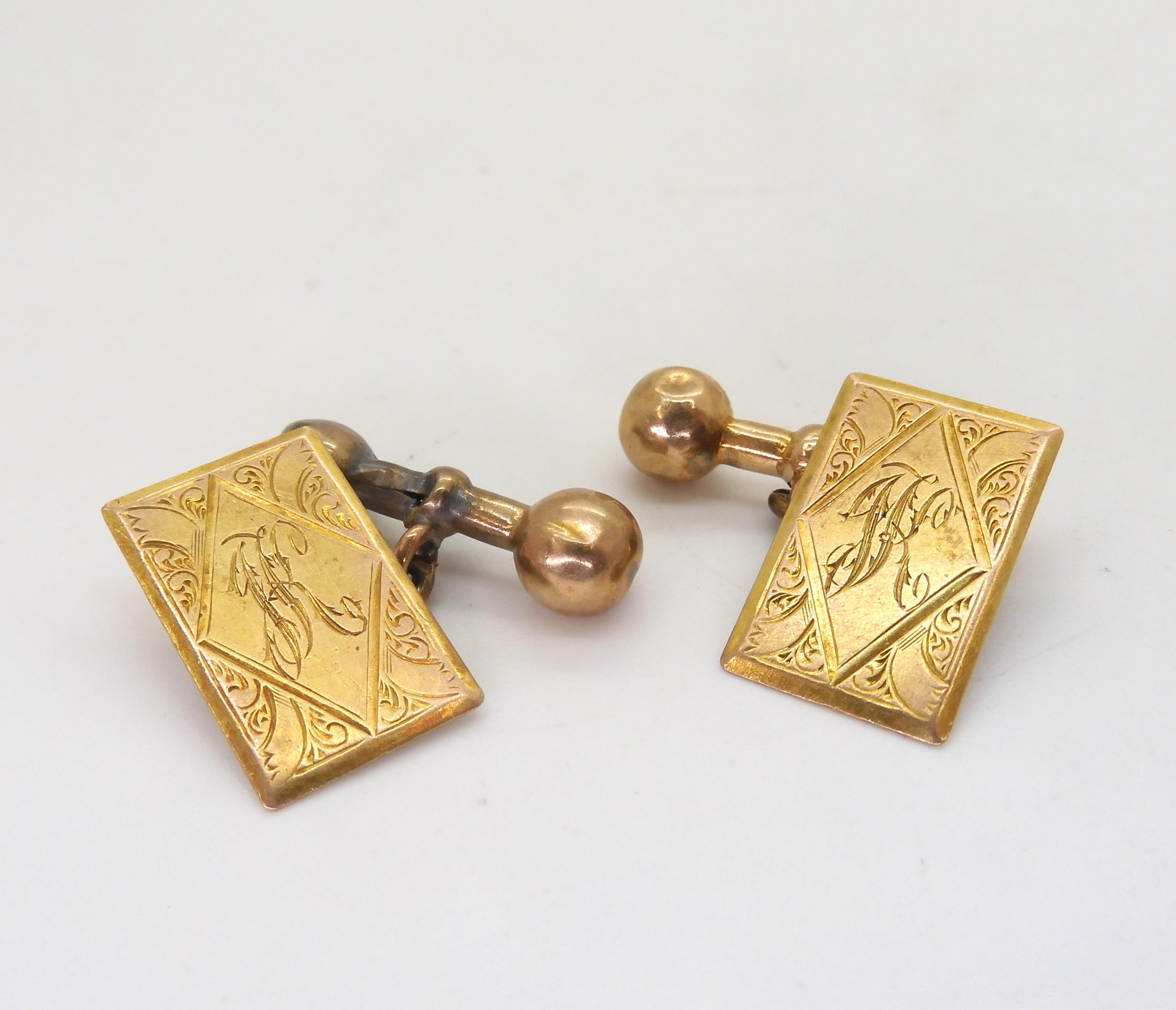 A pair of 9ct gold engraved cufflinks, with monogram and inscribed with the date verso 4/9/1930.