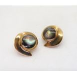 A pair of 9ct gold black mother of pearl clip on earrings, makers mark MD Sheffield circa 1997,
