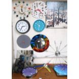 A large mixed lot to include assorted retro wall clocks, wall mirrors etc Condition Report:Available
