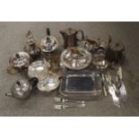 A collection of EPNS including teapots, cased cutlery, brass candlesticks, hotel ware, loose cutlery