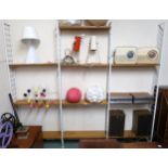 A mid 20th century Staples Ladderax modular shelving system with four uprights and ten shelves,