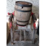 A Victorian R.A. Lister & Co hand cranked butter churn with coopered barrel on stand Condition