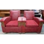 A pair of early 20th century art deco red Rexine upholstered club armchairs, 80cm high x 74cm wide x