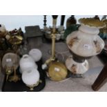 An oil lamp,  a hanging lamp and assorted shades Condition Report:No condition report available.