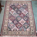 A multicoloured ground floral pattern rug with multicoloured border, 230cm long x 160cm wide