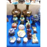 A collection of cloisonne including a pair of vases, a smaller pair, lidded pots, bowl, two