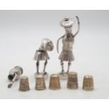A pair of Novelty silver figures of Scots, with removable heads, maker's mark HLB, bases weighted,