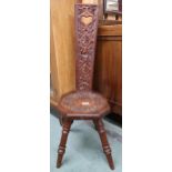 A 20th century spinning chair with carved back and seat on turned supports Condition Report: