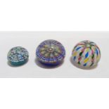 Two Peter McDougall millefiori glass paperweights and another weight Condition Report:Available upon