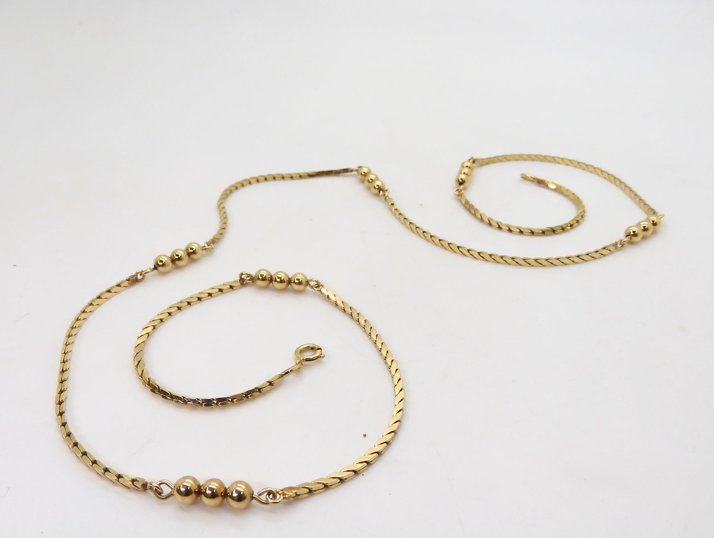 A 9ct gold fancy chain with a beaded detail, length 67cm, weight 17.2gms Condition Report: