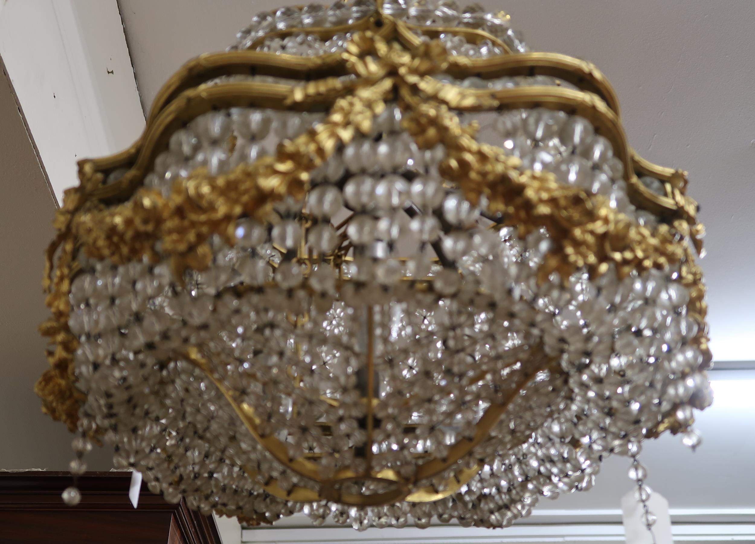 An early 20th century Louis XVI style basket chandelier with cast brass floral swags joined by - Image 3 of 5