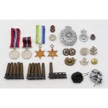 A WW2 Atlantic Star, 1939-45 Star and two War Medals, together with period bullet casings, black