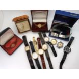 A Smith Empire alarm clock, and a collection of vintage watches and straps to include Ingersoll