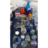 A collection of glass items including paperweights by Harrie Art Glass, Kosta Boda, Mdina, a pair of