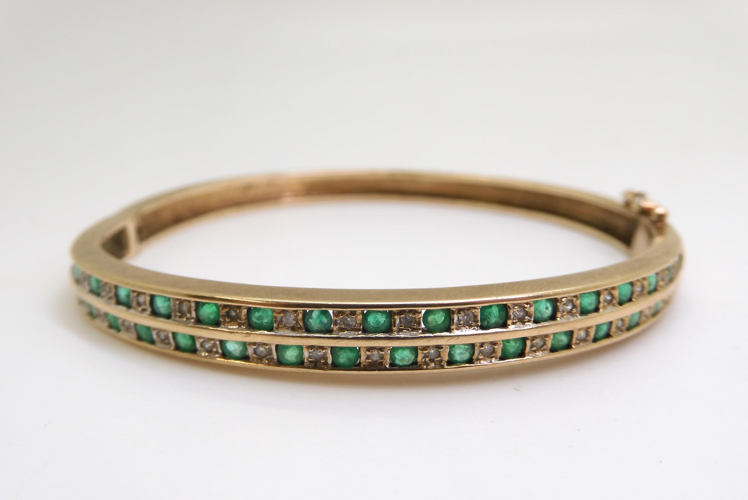 A 9ct gold emerald and diamond bangle, together with a similar cz and emerald ring size N, weight - Image 2 of 4