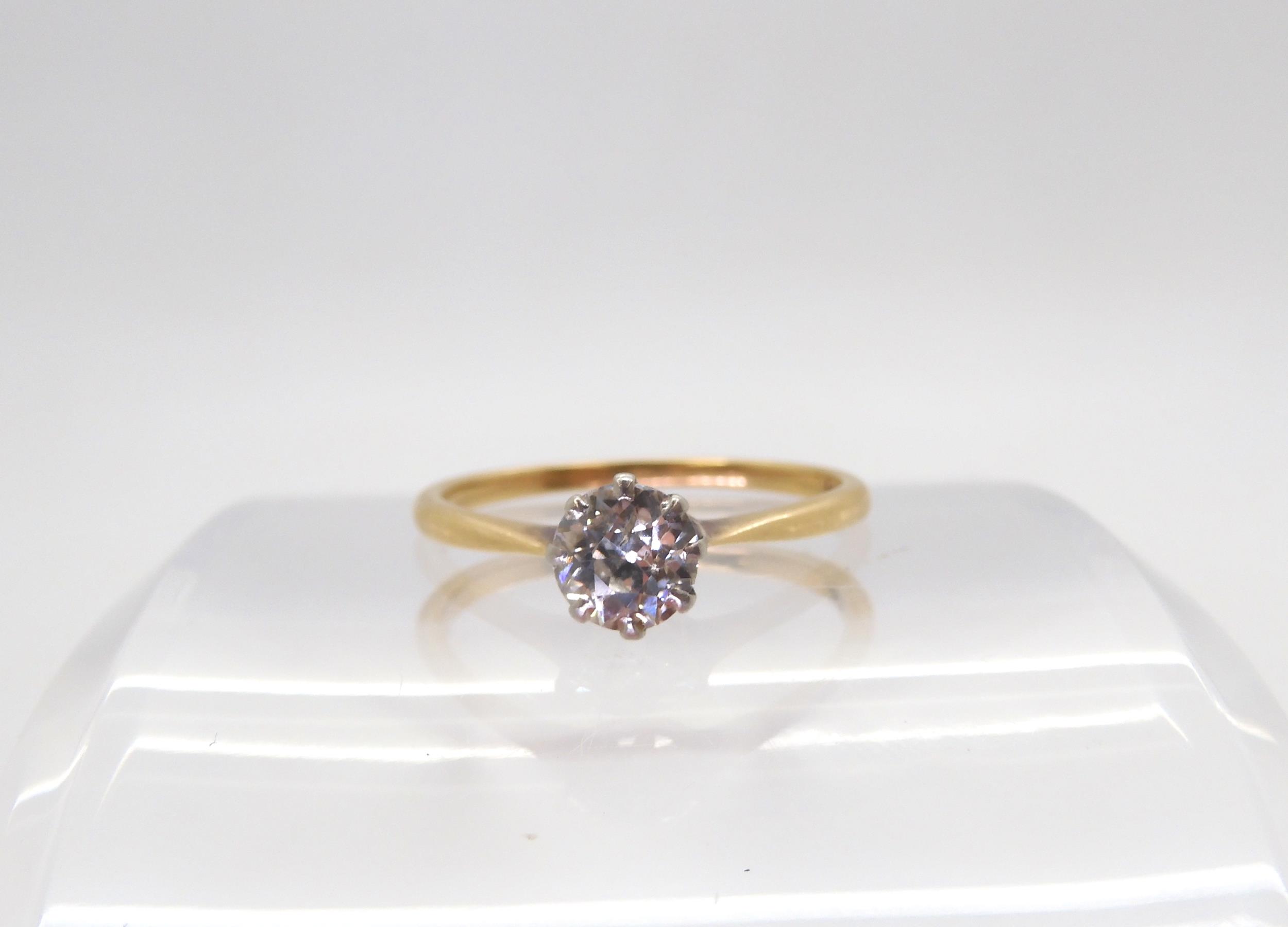 A diamond solitaire ring, set with an estimated approx 0.70cts old cut diamond in a platinum crown