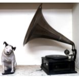 A 20th century shops display of His Masters Voice dog and an early 20th century Roc Electro 550