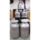 A pair of aluminium W Kerr Lennox Kilbirnie milk cannisters, 69cm high and three smaller stainless