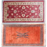 A terracotta ground Kangri rug with Greek key style border, 180cm long x 92cm wide and another small