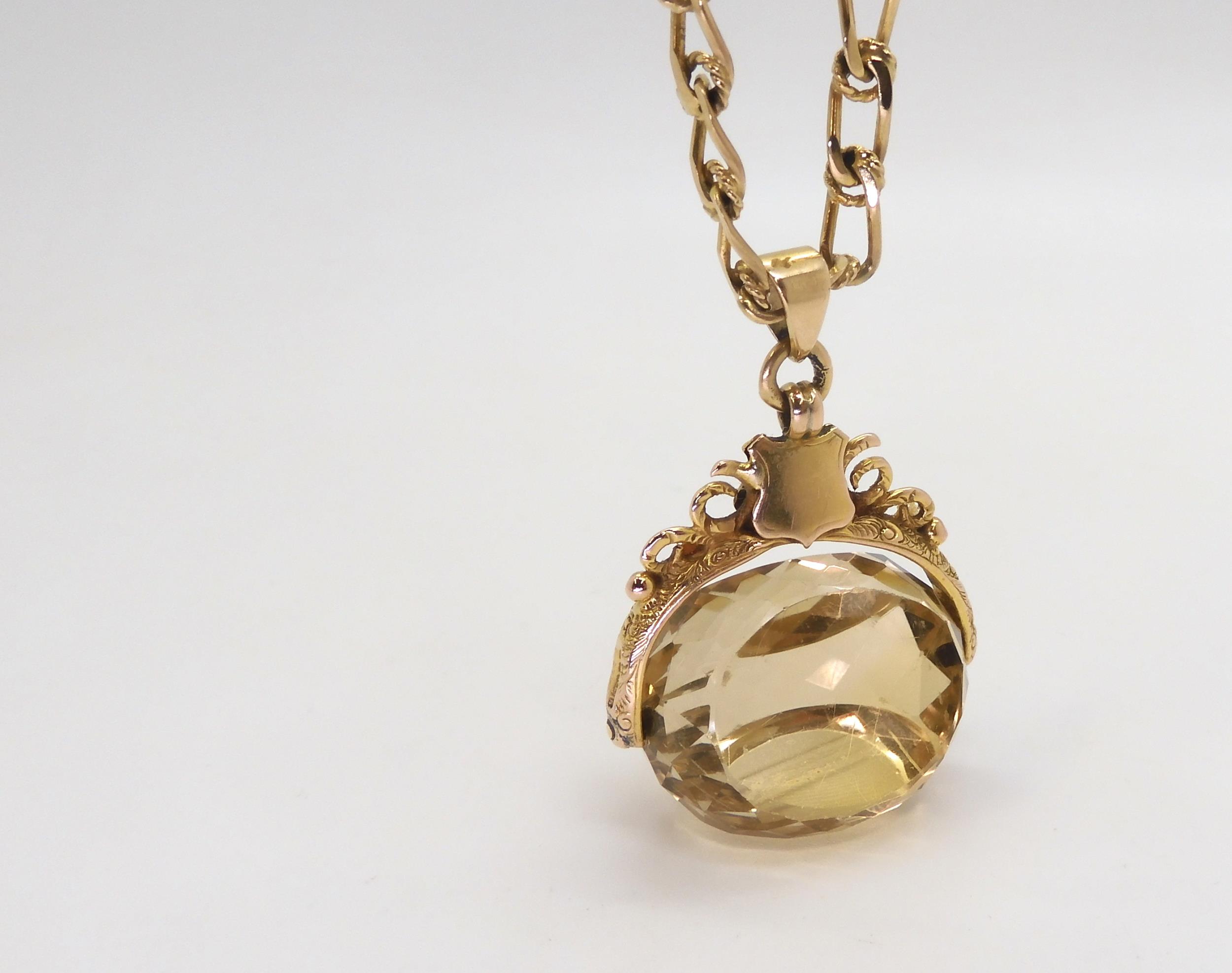 A 9ct citrine fob seal hallmarked Birmingham 1915, on a long 9ct gold fancy chain, length 60cm, - Image 2 of 3