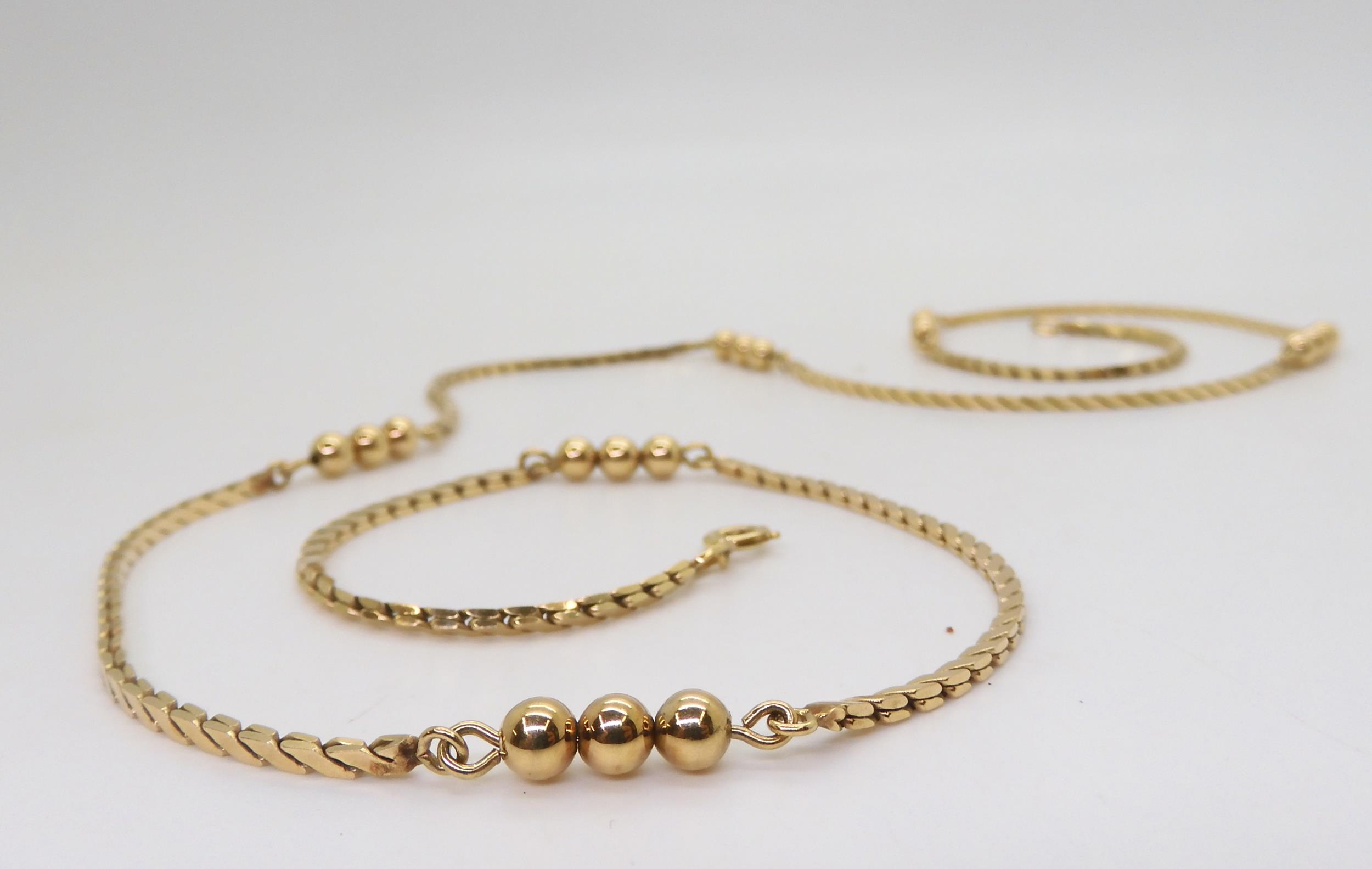 A 9ct gold fancy chain with a beaded detail, length 67cm, weight 17.2gms Condition Report: - Image 2 of 3