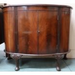 A 20th century mahogany bow front two door cabinet, 80cm high x 95cm wide x 42cm deep Condition