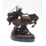 A bronze of a Viking on horseback Condition Report:Available upon request