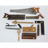A good selection of vintage woodworking tools, comprising a roll of carver's chisels with
