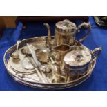 A collection of EPNS including an oval serving tray, with openwork gallery, a four piece EPNS tea