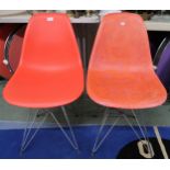 A pair of after Herman Miller for Eames shell chairs, 80cm high Condition Report:Available upon