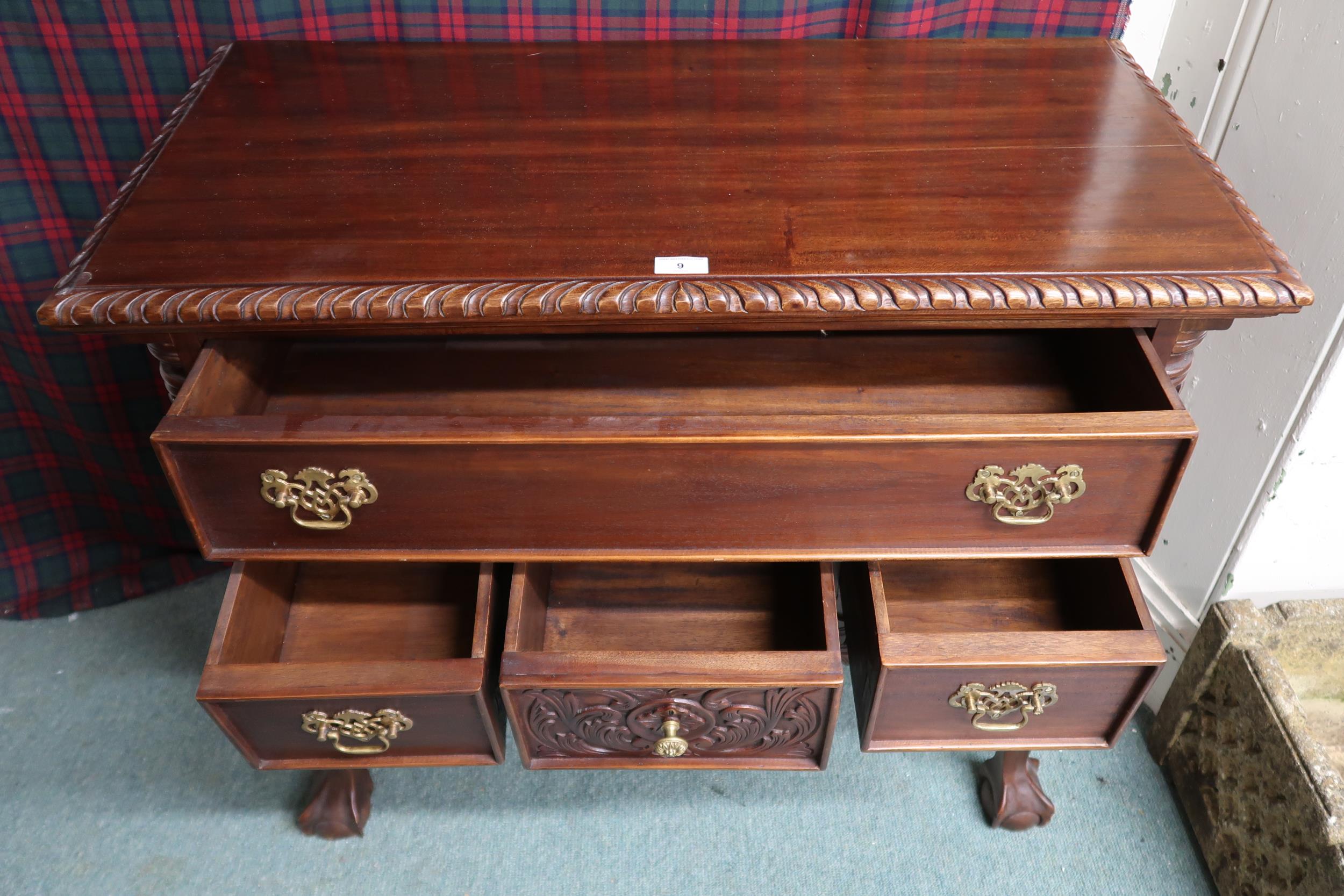 A 20th century mahogany lowboy style chest of drawers with one long over three short drawers on ball - Image 2 of 3