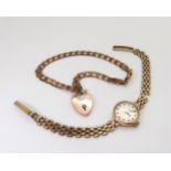 A 9ct rose gold curb chain bracelet with attached heart shaped clasp, together with a ladies 9ct