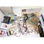 A collection of vintage costume jewellery to include gem set necklaces, swallow brooches, an
