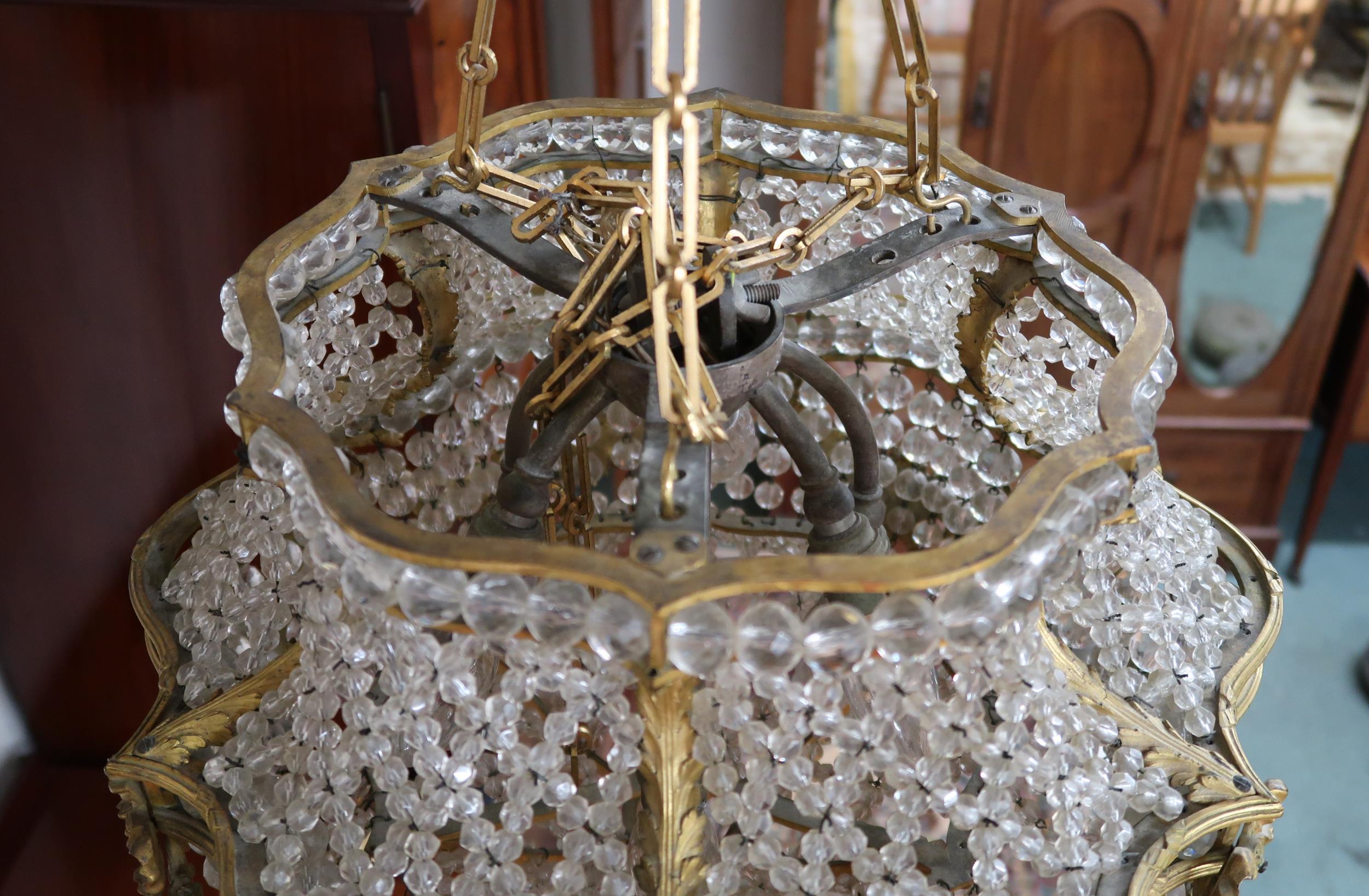 An early 20th century Louis XVI style basket chandelier with cast brass floral swags joined by - Image 5 of 5