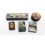 Five Russian painted trinket boxes, some inlaid with mother of pearl Condition Report:Available upon