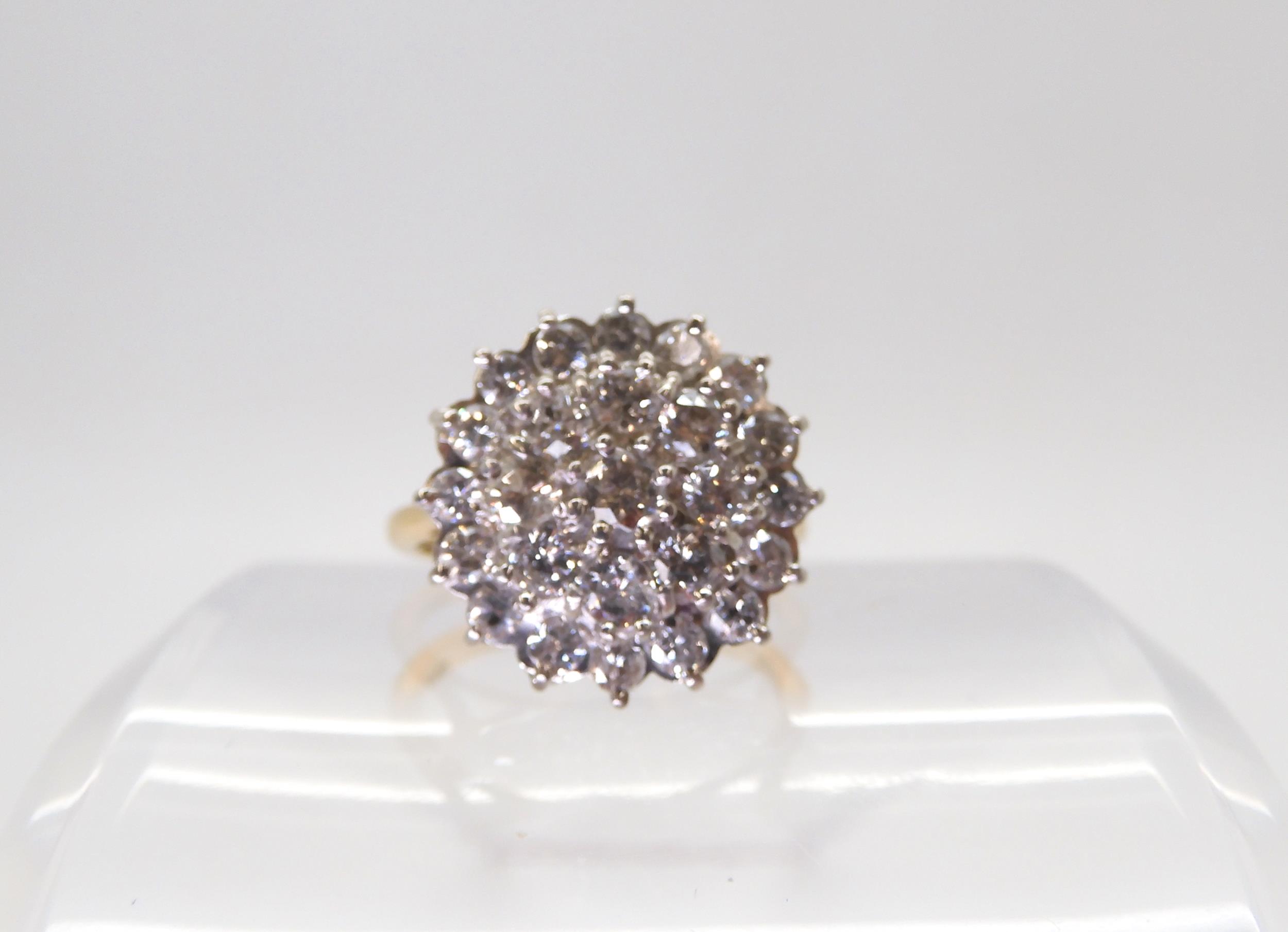 A substantial diamond cluster ring, set with estimated approx 1ct of brilliant cut diamonds,