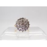 A substantial diamond cluster ring, set with estimated approx 1ct of brilliant cut diamonds,