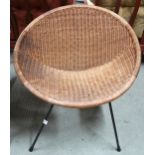 A mid 20th century satellite chair with wicker seat on metallic supports Condition Report: