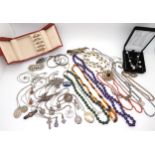 A collection of silver and costume jewellery to include, amethyst, green hardstone and coral