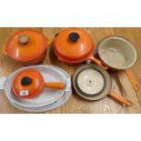 A mixed lot of cast iron enamelled cookware to include Le Creuset pots Condition Report:Available
