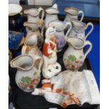 A Staffordshire figure of a Black Watch soldier, another figure and assorted Scottish pottery jugs