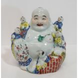 A Chinese laughing Buddha with boys Condition Report:Available upon request