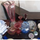 A collection of glass items including a pale blue bubble glass jar and cover and two millefiori