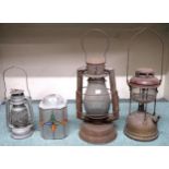 A lot of three assorted Tilley style storm lanterns and a glass light shade (4) Condition Report: