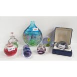 A collection of Caithness glass including a fuchsia scent bottle and inkwell, a vase with hearts and