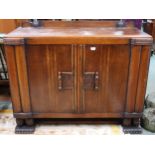 A 20th century mahogany two door sideboard with single doors to sides, 100cm high x 121cm wide x